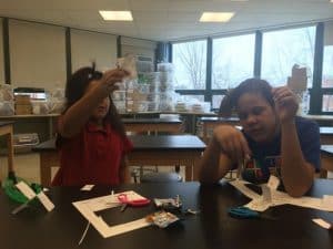 Ashanta and Brianna make model helicopters