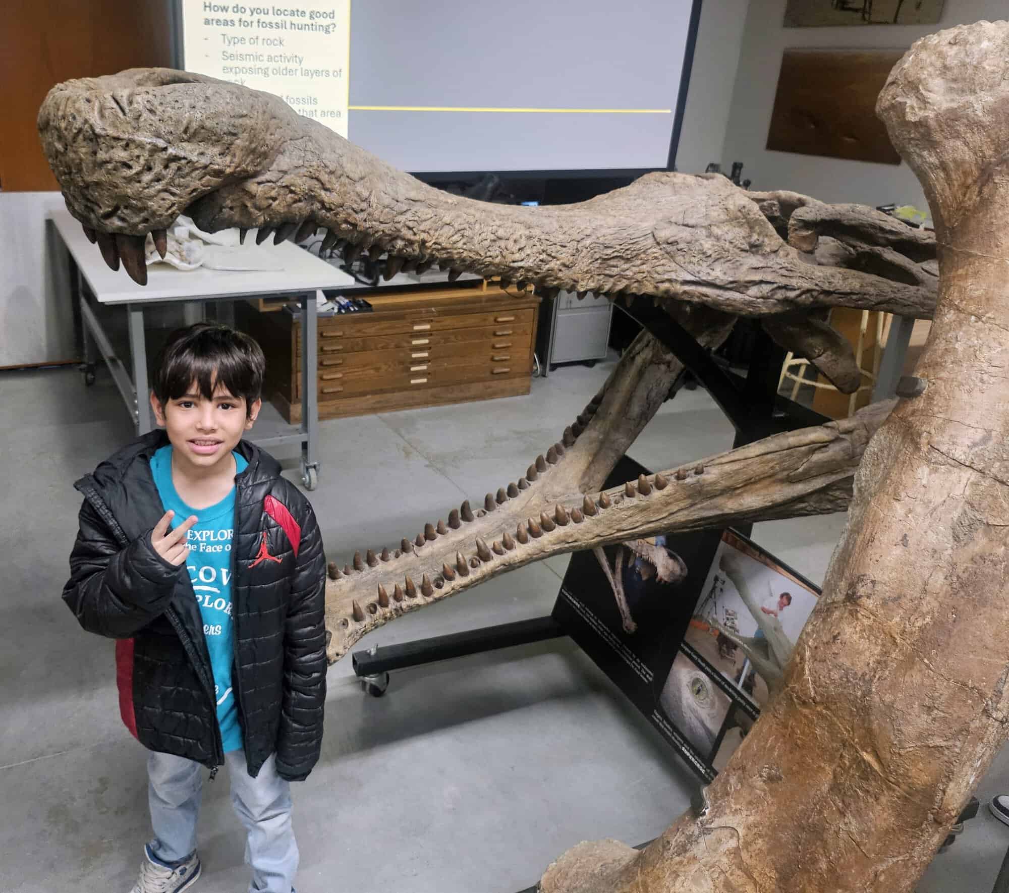 boy with dinosaur jaw